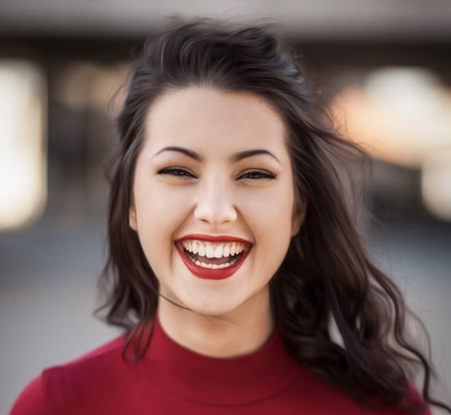 Smiling woman red shirt